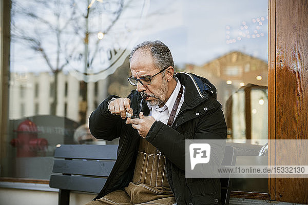 Barber lighting pipe outside barbershop