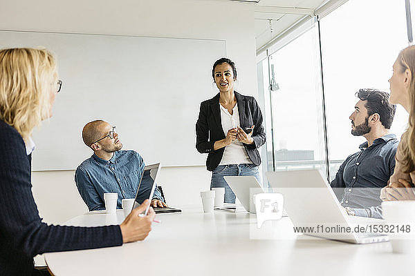 Businesspeople during meeting in conference room