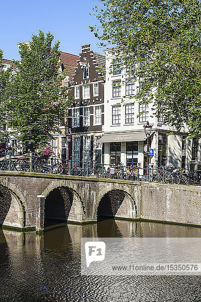 A bridge over the Herengracht canal Amsterdam North Holland The Netherlands Europe