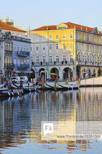Moliceiros moored along the main canal at sunset  Aveiro  Venice of Portugal  Beira Littoral  Portugal  Europe