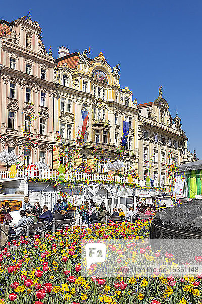 Facades of historical buildings seen from the Easter market at the old town market square  Prague  Bohemia  Czech Republic  Europe