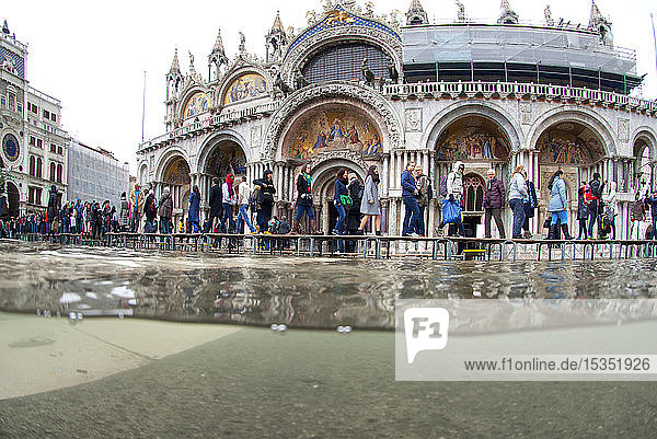 St. Mark's Square and Basilica flooded by high tide Venice UNESCO World Heritage Site Veneto Italy Europe