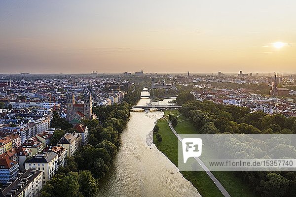 View to city  Isar and green areas with Reichenbach bridge at sunrise  left Maximilianskirche and center Deutsches Museum  aerial view  Munich  Upper Bavaria  Bavaria  Germany  Europe
