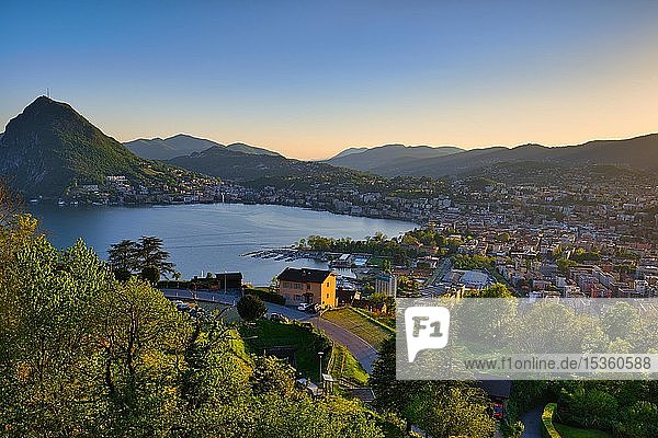 View of Lugano in the evening light with Lake Lugano and Mount San Salvatore  evening light  Canton Ticino  Switzerland  Europe