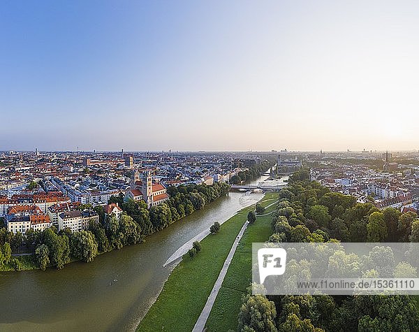 View of the city  Maximilianskirche in Isarvorstadt and Reichenbachbrücke over Isar at sunrise  green areas and Au district on the right  aerial view  Munich  Upper Bavaria  Bavaria  Germany  Europe