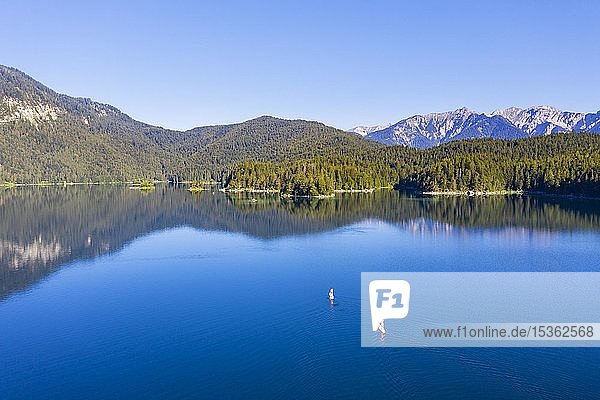 Eibsee lake with Stand Up Paddler  near Grainau  Werdenfelser Land  aerial view  Upper Bavaria  Bavaria  Germany  Europe