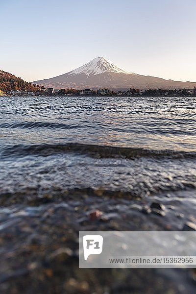 Evening atmosphere  shore with waves  view over Lake Kawaguchi to volcano Mt. Fuji  Yamanashi Prefecture  Japan  Asia