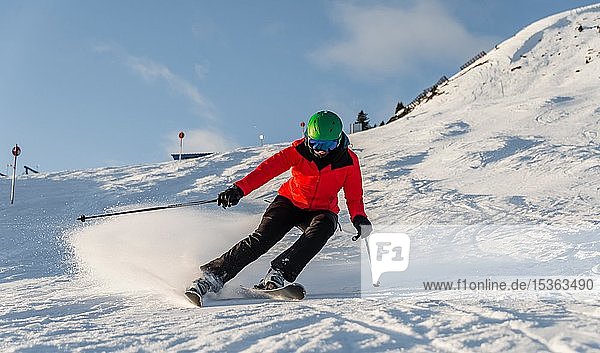 Female skier skiing in short turns  black slope  SkiWelt Wilder Kaiser  Brixen im Thale  Tyrol  Austria  Europe