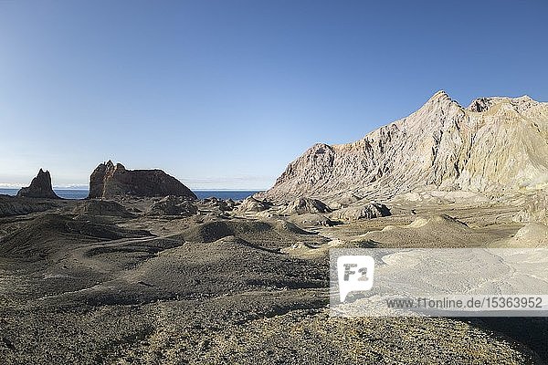 Rock formations on the volcanic island of White Island with shadows of two people  Whakaari  Bay of Plenty  North Island  New Zealand  Oceania