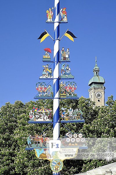 Maypole at Viktualienmarkt  at the back tower of Heiliggeistkirche  Munich  Upper Bavaria  Bavaria  Germany  Europe