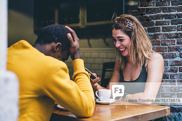 Couple having fun in a coffee shop