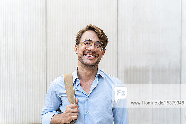 Portrait of laughing casual businessman