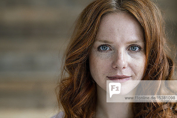 Portrait of redheaded woman with freckles