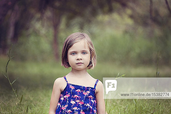 Portrait of little girl in nature