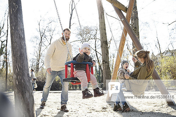 Happy family on playground