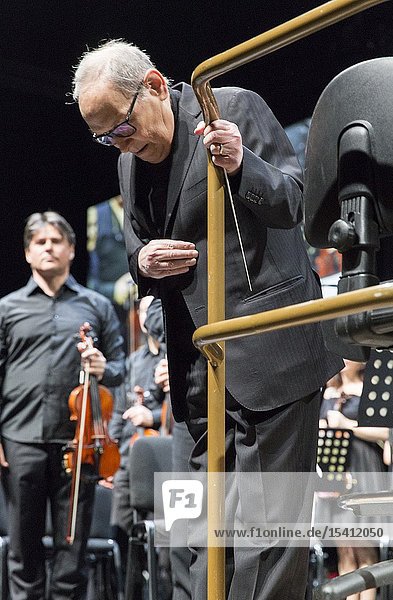 Madrid  Spain- May 07: Italian composer and conductor Ennio Morricone performs on stage during a concert at the WiZink center on may 07  2019 in Madrid  Spain (Photo by: Angel Manzano)