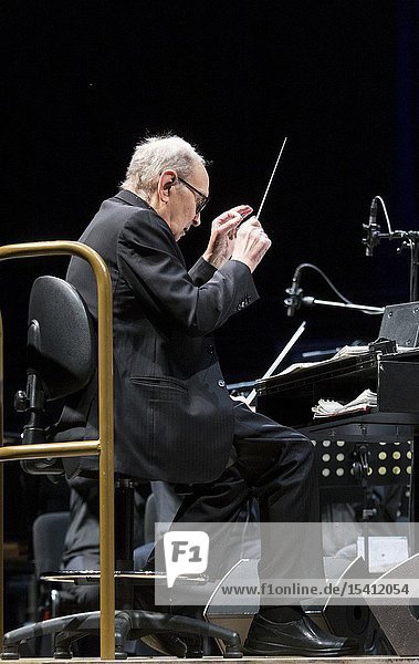 Madrid  Spain- May 07: Italian composer and conductor Ennio Morricone performs on stage during a concert at the WiZink center on may 07  2019 in Madrid  Spain (Photo by: Angel Manzano)