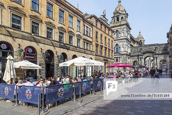 Customers eating outdoors at restaurants and cafes in Glasgow's Italian centre John Street Glasgow Scotland UK.
