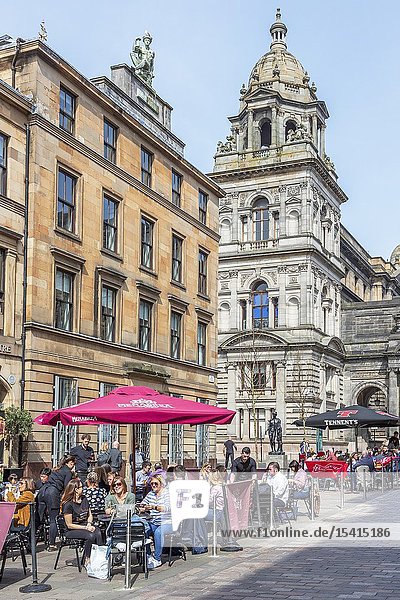 Customers eating outdoors at restaurants and cafes in Glasgow's Italian centre John Street Glasgow Scotland UK.