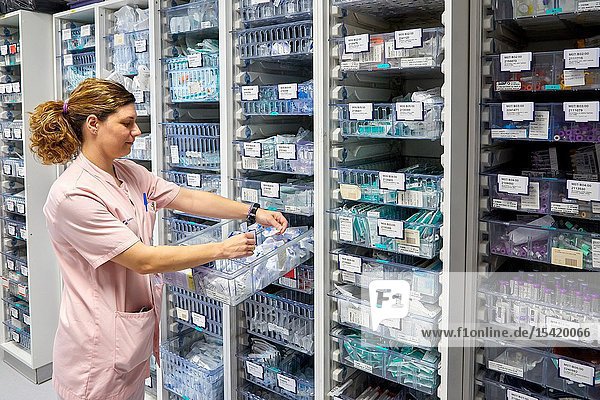 Pharmacy Auxiliary with medical products Delivery rooms Hospital Donostia San Sebastian Gipuzkoa Basque Country Spain