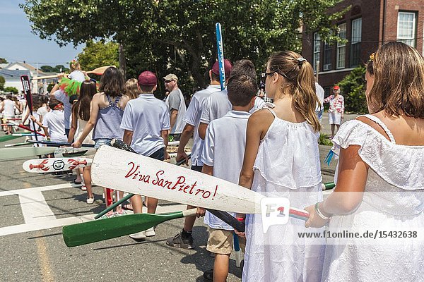 USA New England Massachusetts Cape Ann Gloucester Saint Peters Fiesta Traditional Italian Fishing Community Festival saints prcession carrying boat oars NR.