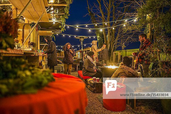 USA New England Massachusetts Cape Cod Provincetown Christmas Fair with visitors dusk.
