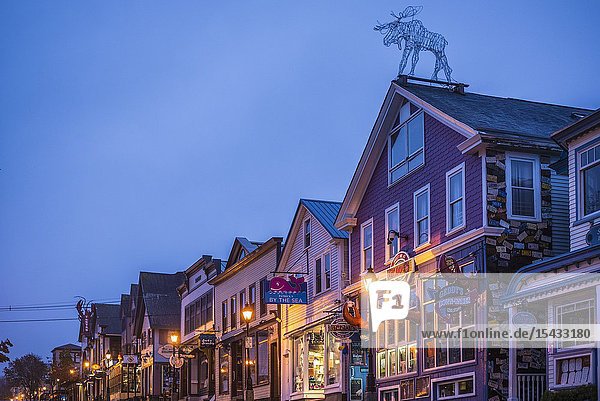 USA Maine Mt. Desert Island Bar Harbor restaurants along Main Street autumn dawn.