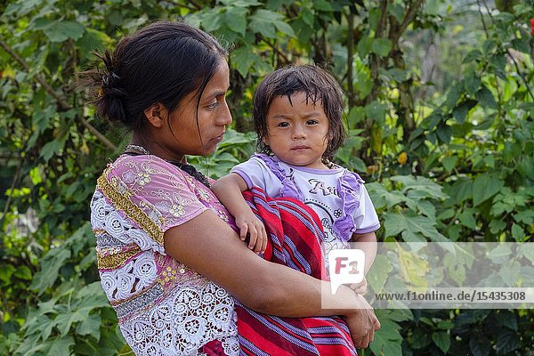 Woman with daughter Lancetillo-La Parroquia Zona Reina Quiche Guatemala America Central.
