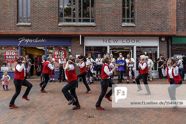 A Group of Female Morris Dancers Perform In The High Street During The Annual Lewes â.Day of Danceâ. Lewes Sussex UK.
