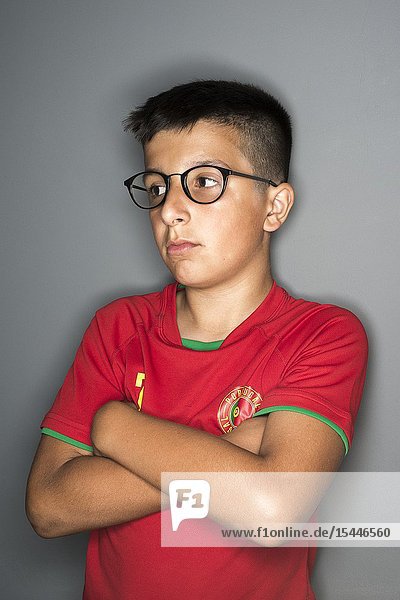 11 years old Portuguese boy in spectacles.
