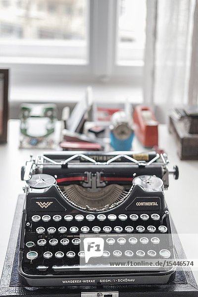 Old German ' Continental' typewriter machine on desktop- selective focus.