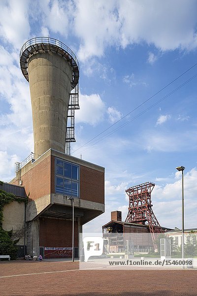 Gelsenkirchen Bismarck D-Gelsenkirchen D-Gelsenkirchen-Bismarck Ruhr area Westphalia North Rhine-Westphalia NRW former coalmine Consolidation 3/4/9 of the Ruhrkohle AG shaft mine Consol hard coal mine ahead the mine fan with diffuser behind pit tower shaft 9 and machine hall in the Consol Park central hoisting shaft industrial monument Route of Industrial Heritage *** Local Caption ***.