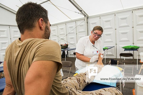 Nijmegen Breukelen Netherlands. Red Cross medical staff taking care of blisters and injuries at the first aid post during the Nijmegen Four Day March 2017.