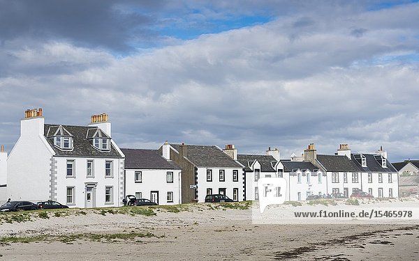 View of whitewashed houses at Port Ellen on Islay in Inner Hebrides Scotland UK.