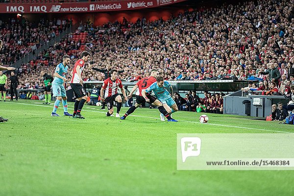 Koke Resureccion (R) Yeray Alvarez (C) and Ibai Gomez (L) fight for the ball in a Spanish League match between Athletic Club Bilbao and Athletico de Madrid at San Mames Stadium on March 16 2019 in Bilbao Spain