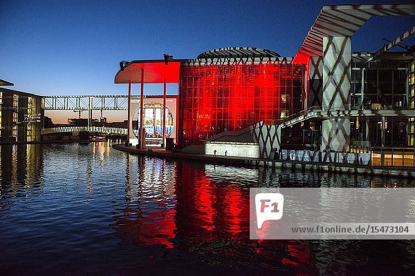 Berlin Germany. Light show being projected on the exterior wall of the German Bundestag buildings narrating the history of the countries political developments.