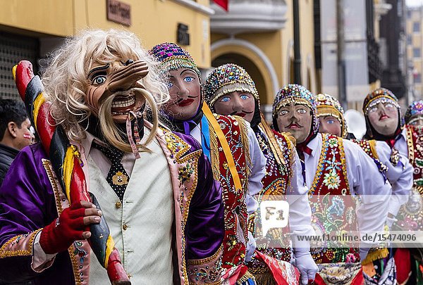 Procession of the Virgen del Carmen of Paucartambo (Cusco) characters and typical costumes. Peru South America.