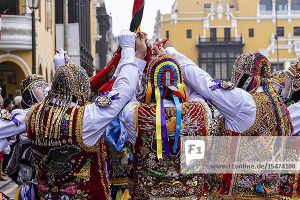 Procession of the Virgen del Carmen of Paucartambo (Cusco) characters and typical costumes. Peru South America.