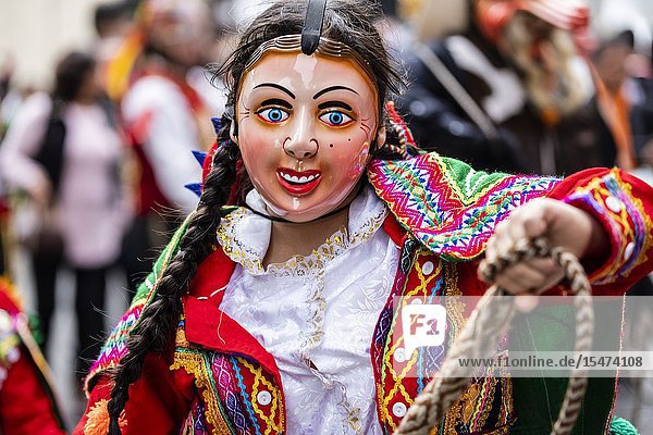 Procession of the Virgen del Carmen of Paucartambo (Cusco) characters and typical costumes. Peru South America.