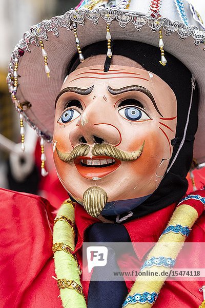 Procession of the Virgen del Carmen of Paucartambo (Cusco) characters and typical costumes. Peru South America.
