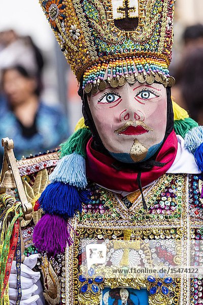 Procession of the Virgen del Carmen of Paucartambo (Cusco) characters and typical costumes. Peru South America.
