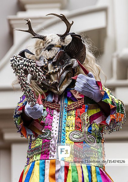 Procession of the Virgen del Carmen of Paucartambo (Cusco) characters and typical costumes. Peru South America.