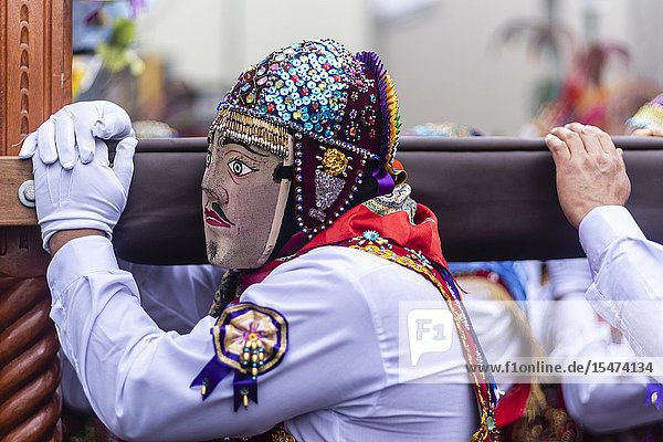 Procession of the Virgen del Carmen of Paucartambo (Cusco) characters and typical costumes. Peru South America.