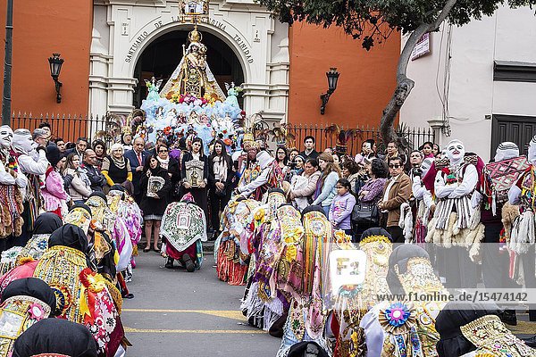 Procession of the Virgen del Carmen of Paucartambo (Cusco) characters and typical costumes. Peru South America.