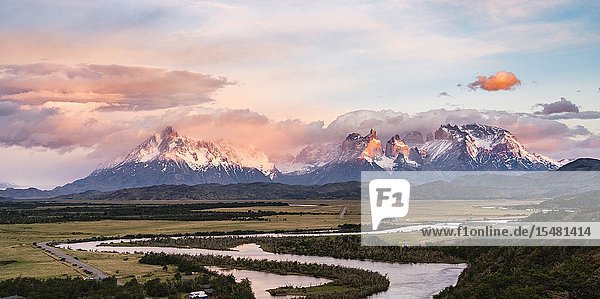 Paine Horns Cerro Paine and Cerro Paine Grande at dawn with Serrano river in the foreground. Torres del Paine National Park Ultima Esperanza province Magallanes region Chile.