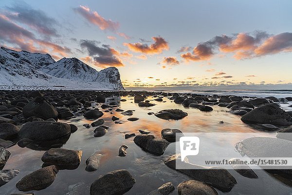 Sunset at Unstad Beach in winter. Vestvagoy municipality Nordland county Northern Norway Norway.
