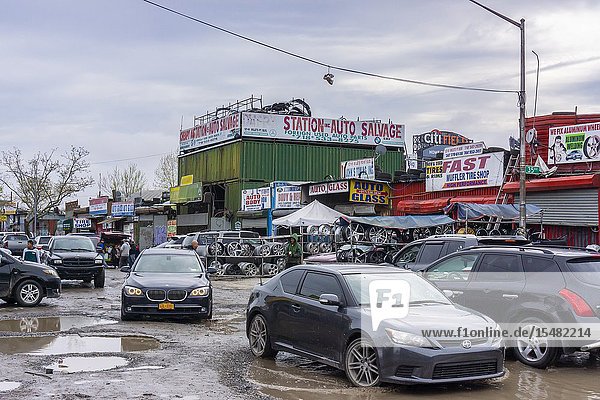 In the shadow of CitiField the automobile repair shops of Willets Point in the borough of Queens in New York are seen on Saturday April 20 2019. The city over the years evicted or bought out most of the businesses and the 61 acre area called the 'Iron Triangle' an industrial area servicing car owners for decades has few remaining repair shops (© Richard B. Levine).