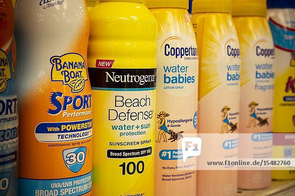 Bottles of sunscreen are seen on a department store shelf in New York on Saturday May 18 2019. The unofficial beginning of summer arrives on the Memorial Day weekend at the end of May. (© Richard B. Levine).