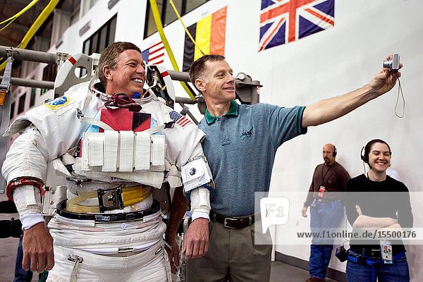 NASA astronaut Chris Ferguson  STS-135 commander  takes a photo of himself with astronaut Mike Fossum before the crew of the final shuttle mission trains March 10  2011 in the Neutral Buoyancy Laboratory near the Johnson Space Center in Houston. Fossum will fly to the International Space Station aboard a Russian Soyuz spacecraft scheduled for launch in May and will serve as flight engineer for Expedition 28 and as commander for Expedition 29. Since the crew of the final shuttle mission will consist of only four astronauts  the ISS crew will perform the mission's single scheduled spacewalk  and the crew of STS-135 will function in support of the EVA  with Rex Walheim serving as the internally-based 'quarterback' for the spacewalk. PhotoHouston Chronicle  Smiley N. Pool
