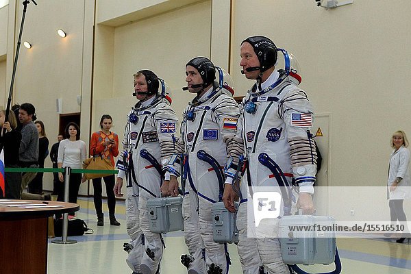At the Gagarin Cosmonaut Training Center in Star City Russia Expedition 46-47 crew members Tim Peake of the European Space Agency (left) Yuri Malenchenko of the Russian Federal Space Agency (Roscosmos center) and Tim Kopra of NASA (right) report for their qualification exams Nov. 20. The trio will launch Dec. 15 on their Soyuz TMA-19M spacecraft Dec. 15 from the Baikonur Cosmodrome in Kazakhstan for a six-month mission on the International Space Station. NASASeth Marcantel